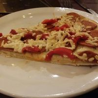 vegan pizza with vegan pepperoni and red peppers  at Poppy's Pizza and Grill in Estes Park