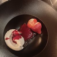 Vegan chocolate brownie with ice cream and berries. at Glada Stinsen in Stockholm