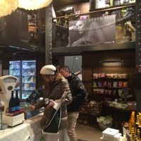 A Homey interiour design welcomes guests to the Hiltl Store. at Hiltl Vegimetzg in Zurich