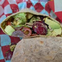 Green Arrow wrap - avocado, grapes, cherry tomatoes, and vegan pesto at Nozzo Pazzo in Vienna