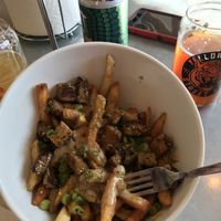 Brunch Fries with vegan gravy and chickun seitan. Next time order 2 bowls! at Yellow City Street Food - YCSF in Amarillo