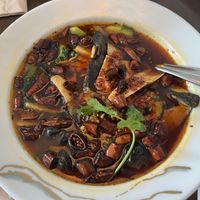 Sliced fisc in sizzling chili oil  at Tofu Vegan - Gloucester Rd in South West London