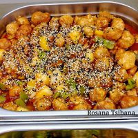 Tofu, sauce, bell pepper and sesame at Loving Hut - Vila Mariana in Sao Paulo