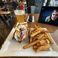 Absolutely delicious. Beer cheese had a creamy texture and mild taste (not like daiya for those who are picky like me). Fries well seasoned and great hazy IPA  at DTW - Atwater Brewery - Gate D24, Concourse D in Detroit