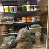 Fridge with ready vegetable drinks and other cold produce. at Mercado Verde in Punta Del Este