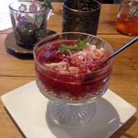 vegan coconut rice pudding with plum compote at Vengo Die Gemusekuche in Bremen