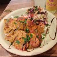 Fully vegan potato gratin with salad. at Vengo Die Gemusekuche in Bremen