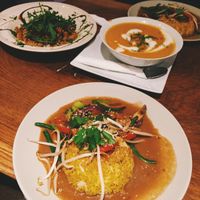 Main entrees: Pasta with Sage, sundried tomatoes, olives and arugula, Asian vegetables in curry sauce with turmeric rice and carrot soup with coconut milk at Vengo Die Gemusekuche in Bremen