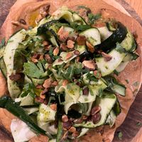 Flatbread pizza with hummus and zoodles at CASA GAÏA in Bordeaux
