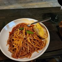 Pasta putanesca  traditional anchovies replaced with thinly sliced spiced egg plant at The Drunken Sailor in Roatan