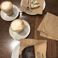 Cappuccino with oat milk, vegan raw swirl cheesecake and tahini brownie  at SLA - Westerstraat in Amsterdam