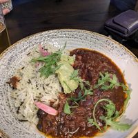 Mushroom chilli with wild rice and pickles at Ye Olde Trip To Jerusalem  in Nottingham