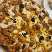 Curry chicken pizza at Gokul Raas Vegetarian - Little India in Central Singapore