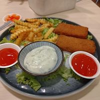 Expensive and small portion size fish and chips, completely different from the menu photo at Gokul Raas Vegetarian - Little India in Central Singapore