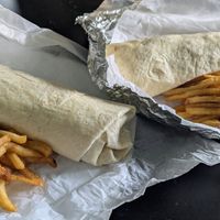 The fries pictured are all from one order of fries. The wraps are like the size of a forearm! at Vida Verde in Johnstown
