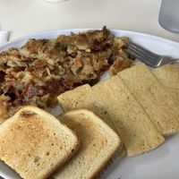 Grilled tofu breakfast with hashbrowns and sourdough toast.   at Pancakes Plus  in Nanuet