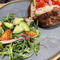 Jacket potato with hummus    at Market Street Bakery in Crewkerne