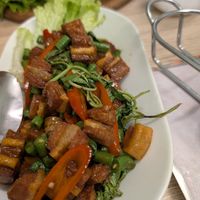 Fried faux pork with basil at Tess Vegan Cafe in Pattaya