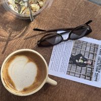oat flat white + vegan matcha chia pudding  at mu.sō coffee  in Los Angeles