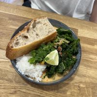 Thai curry with bread  at Chaya Canteen in Bristol