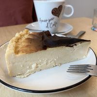 Homemade cheesecake & americano  at Black Cat Santiago in Santiago De Compostela