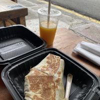 Burrito with orange juice  at Jet Fuel Coffee Shop in Jaco