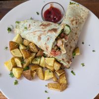 Falafel wrap with baby potato wedges at Fruit Cafe in Ahangama