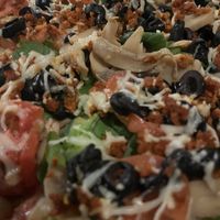 Close up of vegan supreme pizza ft chorizo   at Scuola Pizza  in Gainesville