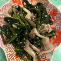 Oyster mushrooms and spinach at Café China - 傾國傾城 in New York City