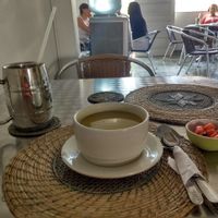 Vegetable soup, guava juice and a small dish of papaya and raisins. at Govinda's in Barranquilla