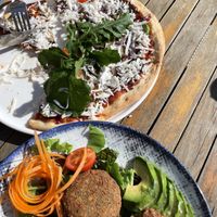 Falafel salad and pizza with grilled vegetable and vegan cheese  at Ey's Cafe Bistro in Fethiye