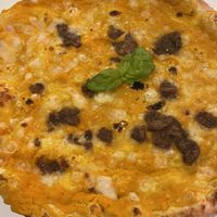 Pizza with vegan mozzarella, mushrooms and pumpkin   at Grezzo Impasto e Peccati in Bellusco