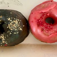 Black sesame, raspberry  at Doce Donut Co  in Seattle