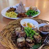 5-spice rolls (front) and banana leaf nasi campur (back)
 at Loving Hut in Central Singapore