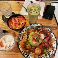 Nachos, takis elote, matcha and strawberry horchataa  at Penelope's Vegan Taqueria - Pilsen in Chicago