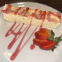 Lemon and raspberry mousse, with raspberry sauce and a strawberry.  at The Clay Pipe Inn  in Poole