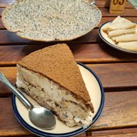 Tiramisu and behind the cracker with cheese on the right at Chickpea Eatery in Da Nang