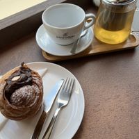 Chocolate hazelnut krafin and pineapple and peach tea 🧡  at Kávafaktura  in Prague