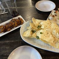 Onion bhajis and poppadoms and dips  at Two Fat Indians in Christchurch