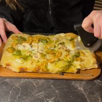 Vegan pizza with soya chicken  at Bresca  in Malaga