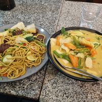 Hokkien noodles with vegan beef on the left and tofu laksa on the right. at Peace Harmony in Sydney