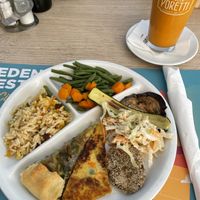 Vegan selection served with freshly made juice  at Capre e Cavoli in Brescia