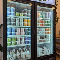 So many choices of regular and monthly flavours! at Honey's - Queen St E in Toronto