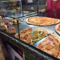 Pizza veg and non-veg on right, more veg on left. at Pizzeria L'Angelo in Venice