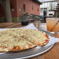 Vegan Cheese Pizza and cocktaills  at Planet Marfa  in Marfa