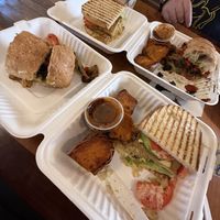 Grilled tofu Reuben and portobello panini with sweet potato fries. Both were great!   at Green Leaf in Framingham