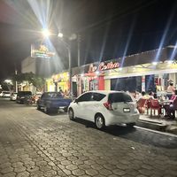 From street  at Pupusería La Ceiba in Santa Ana