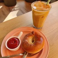 Vegan sausage bagel with curry (or ketchup) + golden coconut drink at Bagels & Beans - Oude Ebbingestraat in Groningen