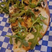 Rockies Favorite with red pepper and vegan parmesean at The Pizza Bar in Denver