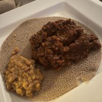 Red le tiles with split peas on the side   at DAS Ethiopian in Washington